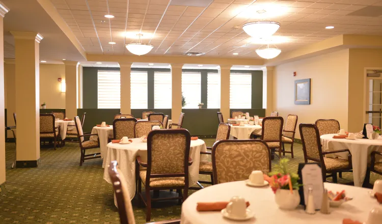 Saratoga Dining Room, many round dining tables can be seen with their places set
