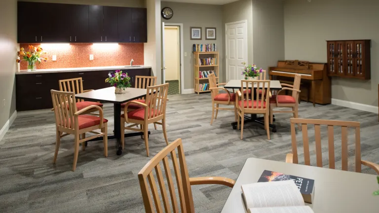 Tables and chairs in a common room