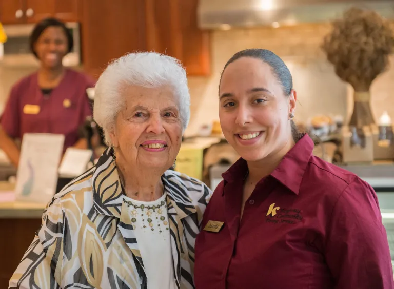 Senior living resident and staff