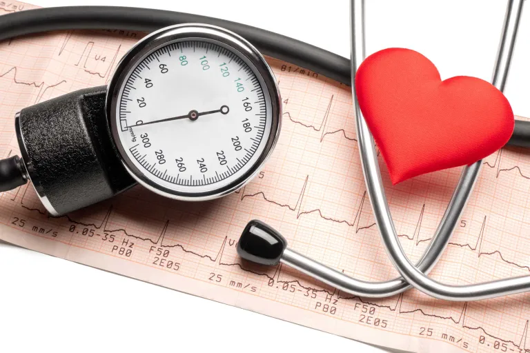 Stethoscope next to a red heart shape